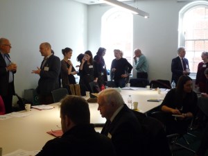 RIN 3 attendees at the tea break, enjoying tea and pastries.